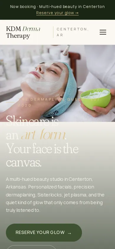Home page of the KDM Derma Therapy website on a phone